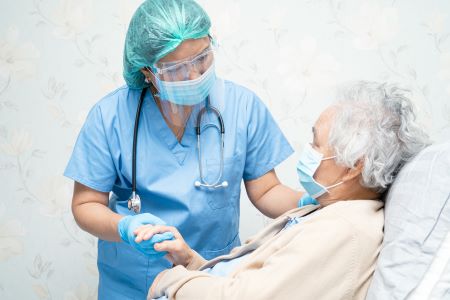 Nurse caring for patient