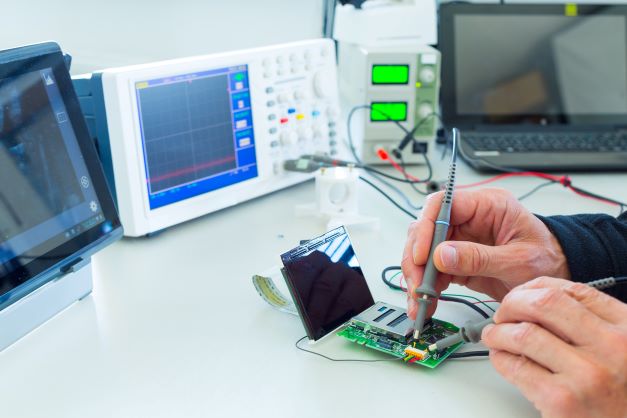 healthcare worker calibrating medical device