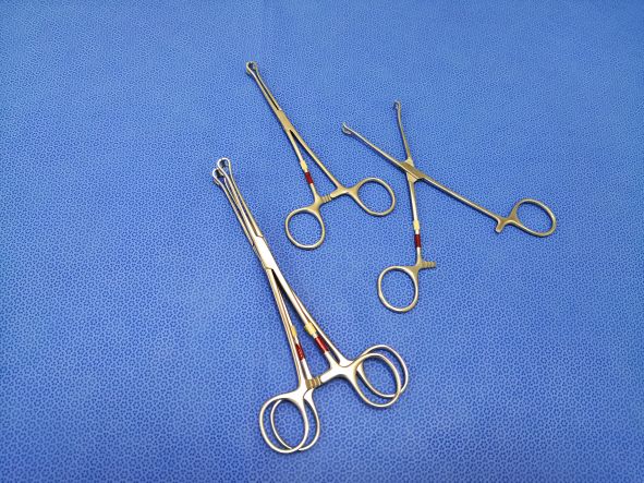 Surgical instruments coded with tape