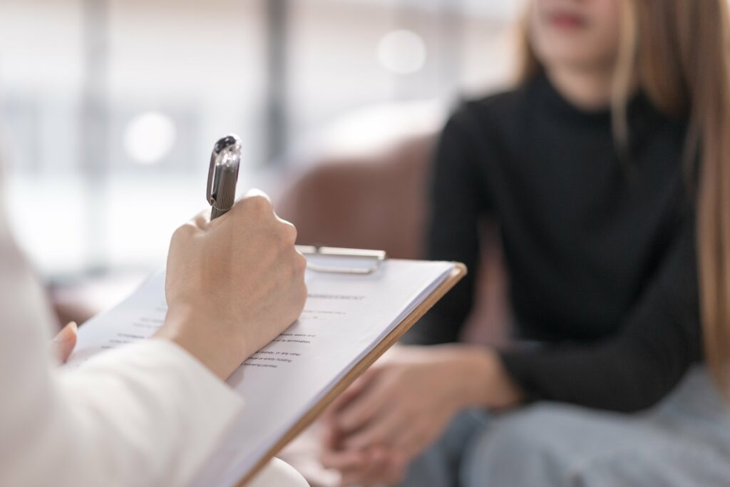 Therapist interviewing patient for treatment plan