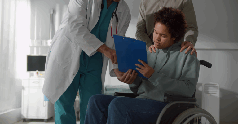 Patient receiving discharge instructions from doctor in the hospital.