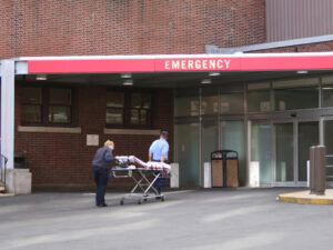 Patient being brought into the emergency room on a stretcher.