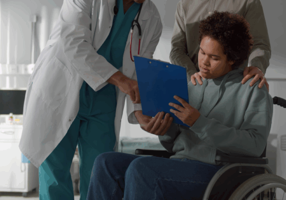 Patient receiving discharge instructions from doctor in the hospital.